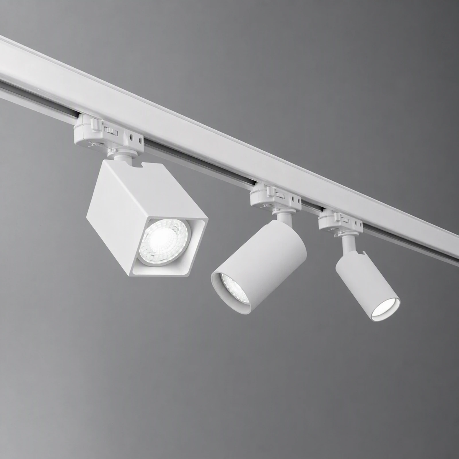 Dynamite Tr 3-phase Mini Round White installed in an interior